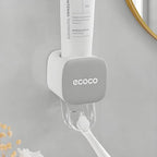 Toothpaste Dispenser Wall Mounted for Bathroom - Automatic Toothpaste Squeezer Hands Free Wall Mount Toothpaste Holder for Kids and Adult, Home Essentials (Grey-1Pcs)