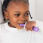 Ubbi 360° Baby Training Toothbrush with Safety Shield and Cover, Food-Grade Platinum Silicone, Gentle Cleaning for Infants, Smoothie Purple