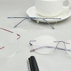 Eyekepper 3-Pack Round Rimless Metal Reading Glasses Women Men - Circle Frameless Readers (Blue/Red/Purple)+1.25