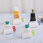 Toothpaste Tube Squeezers Toothpaste Roller - Manual Toothpaste Tube Roller Squeezer Tool, Toothbrush Squeezers, Toothpaste Clip Holder Stand Winder by XYKEEY (Multi-Colored)