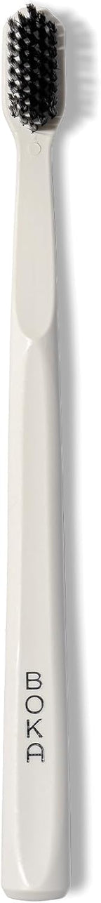Boka Classic Manual Toothbrush with Extra Soft Activated-Charcoal, Tapered Bristles, Bioplastic Handle That Includes Travel Cap, Dentist-Approved, Great for Adults and Kids, White (Pack of 1)