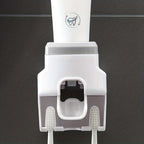 Automatic Toothpaste Dispenser Wall Mounted-Hands-Free Toothpaste Squeezer with 2 Toothbrush Holders & Strong Adhesive - Smart Bathroom Organizer for All Ages