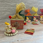 LOVENSPIRE Ganesha Gift Hamper Hindu Religious Ganesh Chaturthi Diwali Puja Housewarming Teej Sankranti Return Gifts - Potli Basket Box Haldi Kumkum Packet & Ganesha Haldi Kumkum Holder