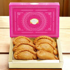 Ghasitaram Gifts Jaiccha Holi- Sweet/Holi Hampers/Thandai Big Pink Tray of Gujiyas, Nmakeen, Sweets/Bites, Thandai and Organic Gulal