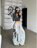 Trendy Sweatpants Women Oversized Graphic Print Grunge Pants Elastic Waist Cinched Bottom Streetwear Goth Sweatpants