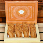 Ghasitaram Gifts Jaiccha Holi- Sweets/Holi Hampers/Thandai Ghasitaram Orange Hamper Box with Sugarfree Wheat Gujiyas, Wheat puffs and Moong Chakli