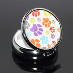 Portable Round Metal Pill Box Case, Art Abstract Painting Lid, Mini Medicine Tablet Organizer Container Holder with 3 Compartments (Colorful Little Dog Footprints on Black)