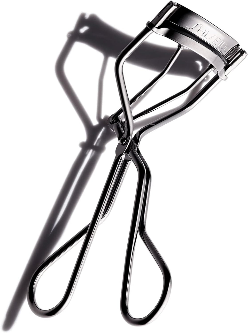 Shiseido Eyelash Curler - Crimps & Curls Lashes for Perfect, Eye-Framing Fringe - Gentle & Safe - Includes Replacement Pad