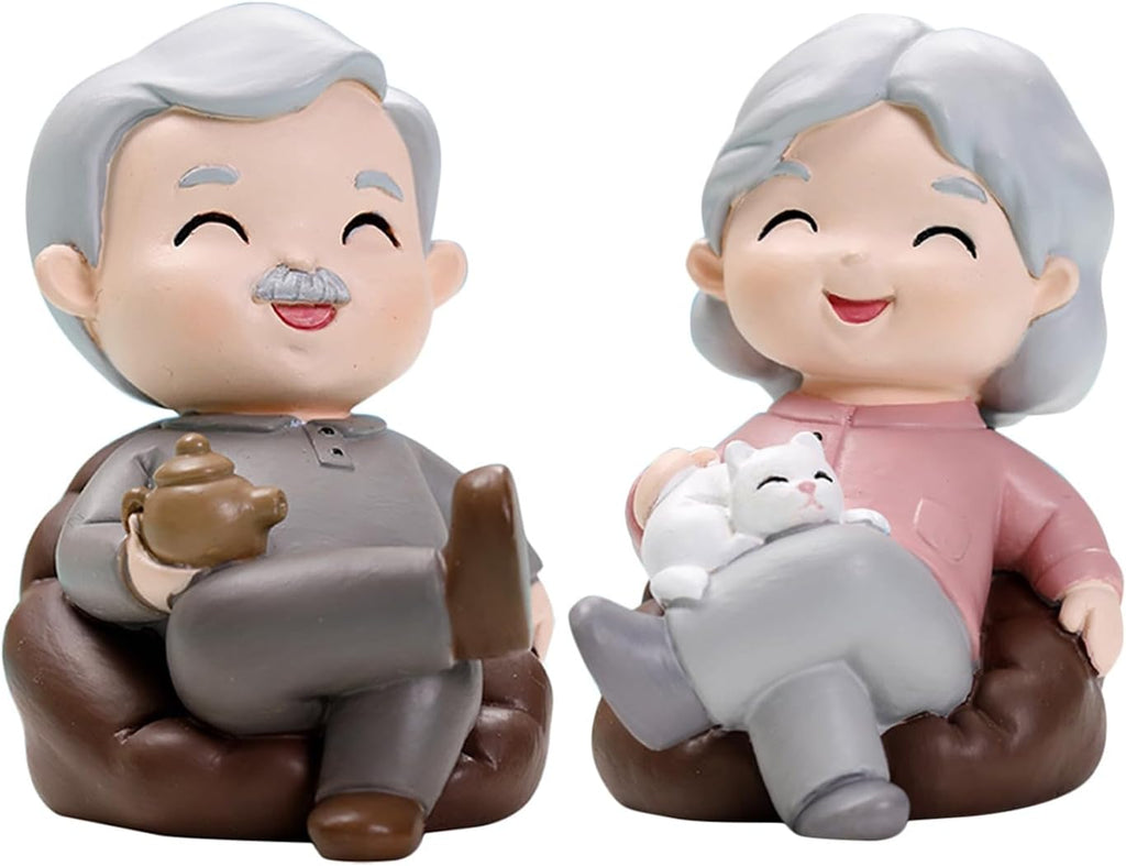LUOZZY 2 Pcs Elderly Grandpa Grandma Figurine for Wedding Anniversary Birthday Party Cake Topper Decorations (Sofa Grandmother Grandfather)