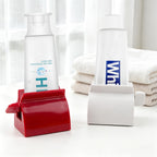2Pcs Rolling Toothpaste Squeezer, Toothpaste Dispenser Rollers, Tube Squeezer Seat Holder Stand for Bathroom Accessories, White and Red