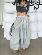 Trendy Sweatpants Women Oversized Graphic Print Grunge Pants Elastic Waist Cinched Bottom Streetwear Goth Sweatpants