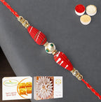 Ghasitaram Gifts Rakhi for Brother Rakhis Online - RM- 711 Premium Rakhi with 200 GMS of Besan Barfi and 200 GMS of Kaju Katli