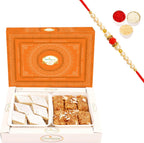 Ghasitaram Gifts Rakhi Gifts for Brothers Rakhi Sweets - Box of Kaju Katli and Milk Cake with Pearl Beads Rakhi