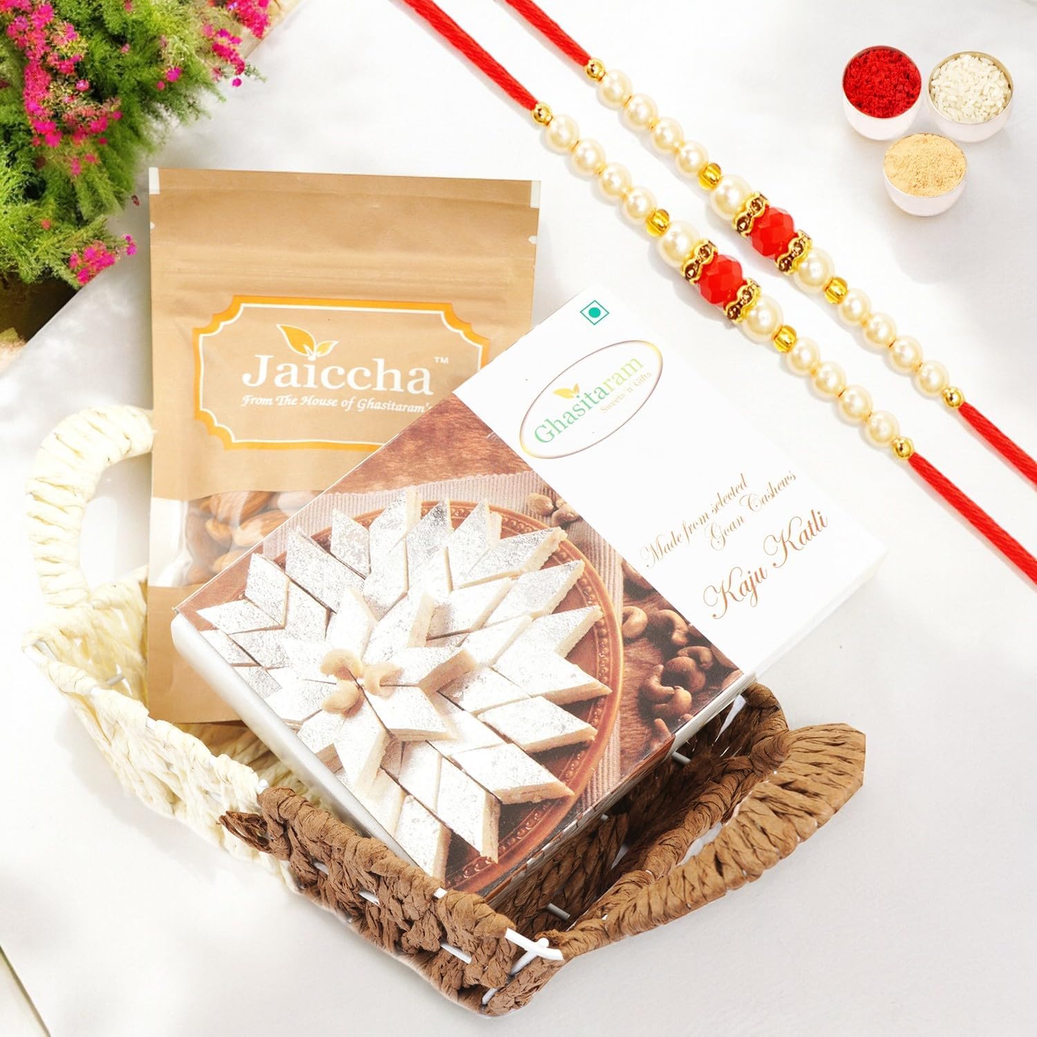 Ghasitaram Gifts Rakhi Gifts for Brothers Rakhi Sweets - Small Metal Brown Basket of Kaju Katlis and Almonds with 2 Pearl Beads Rakhis