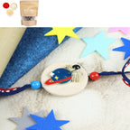 Ghasitaram Gifts Jaiccha Rakhi for Brother Rakhis Online KR24-040- Metal Space Kids Rakhi with Chocolate Coated Almonds 200 gms