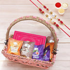 Ghasitaram Gifts Jaiccha Rakhi for Brother - Pink basket with bites and milk cake with 2 rakhi