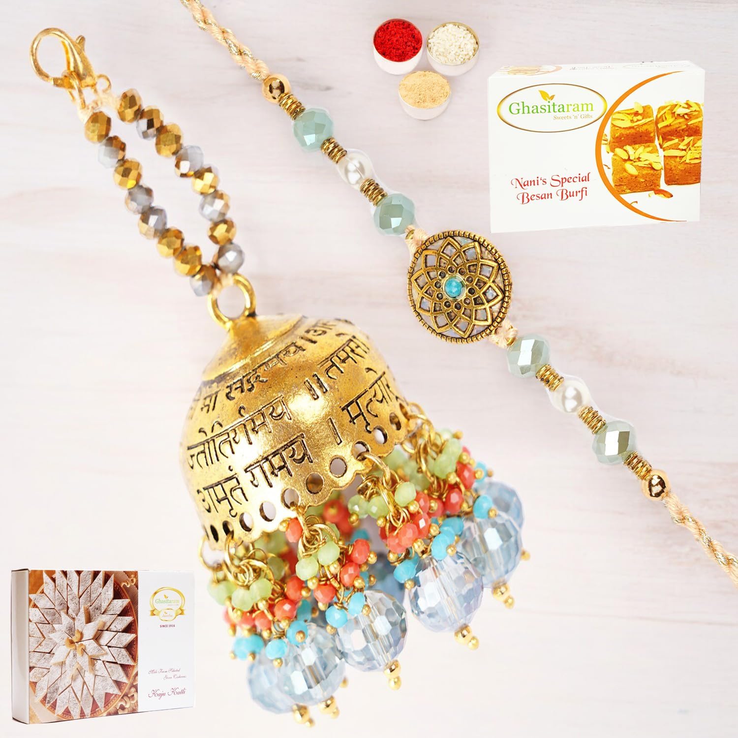 Ghasitaram Gifts Rakhis Online - Rakhi for Brother-RM-270 Bhaiya Bhabhi Rakhi with 200 GMS of Besan Barfi and 200 GMS of Kaju Katli