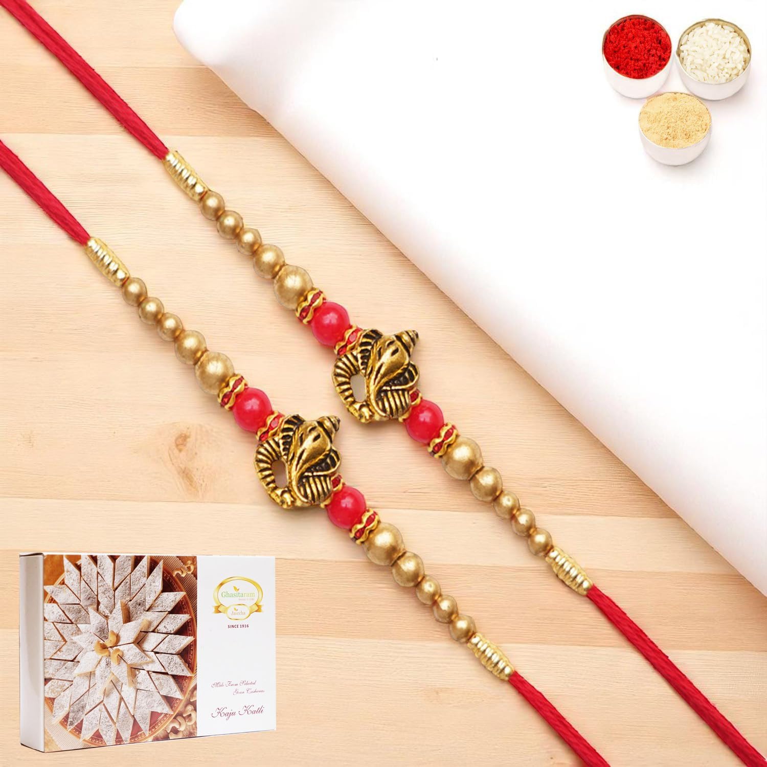 Ghasitaram Gifts Jaiccha Rakhis for Brother Rakhis Online - Set of 2 - Y-26 Ganesha divine Rakhi with 400 gms of Kaju katli