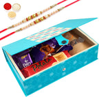 Jaiccha Ghasitaram Rakhi Gifts for Brothers - Blue Rectangular Box of Milk Chocolates,Caramel Toffees, Chocolates, Chocolate Almonds, Potata Biscuits with 2 Pearl Rakhis