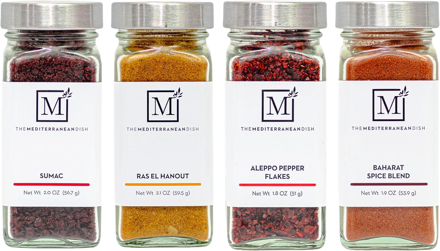 The Mediterranean Dish Exotic Middle Eastern Spice Bundle - Baharat, Ras El Hanout, Aleppo Pepper and Sumac - Gourmet Mediterranean Seasonings Set - Warm, Tangy and Aromatic Blends - Set of 4 Glass Bottles