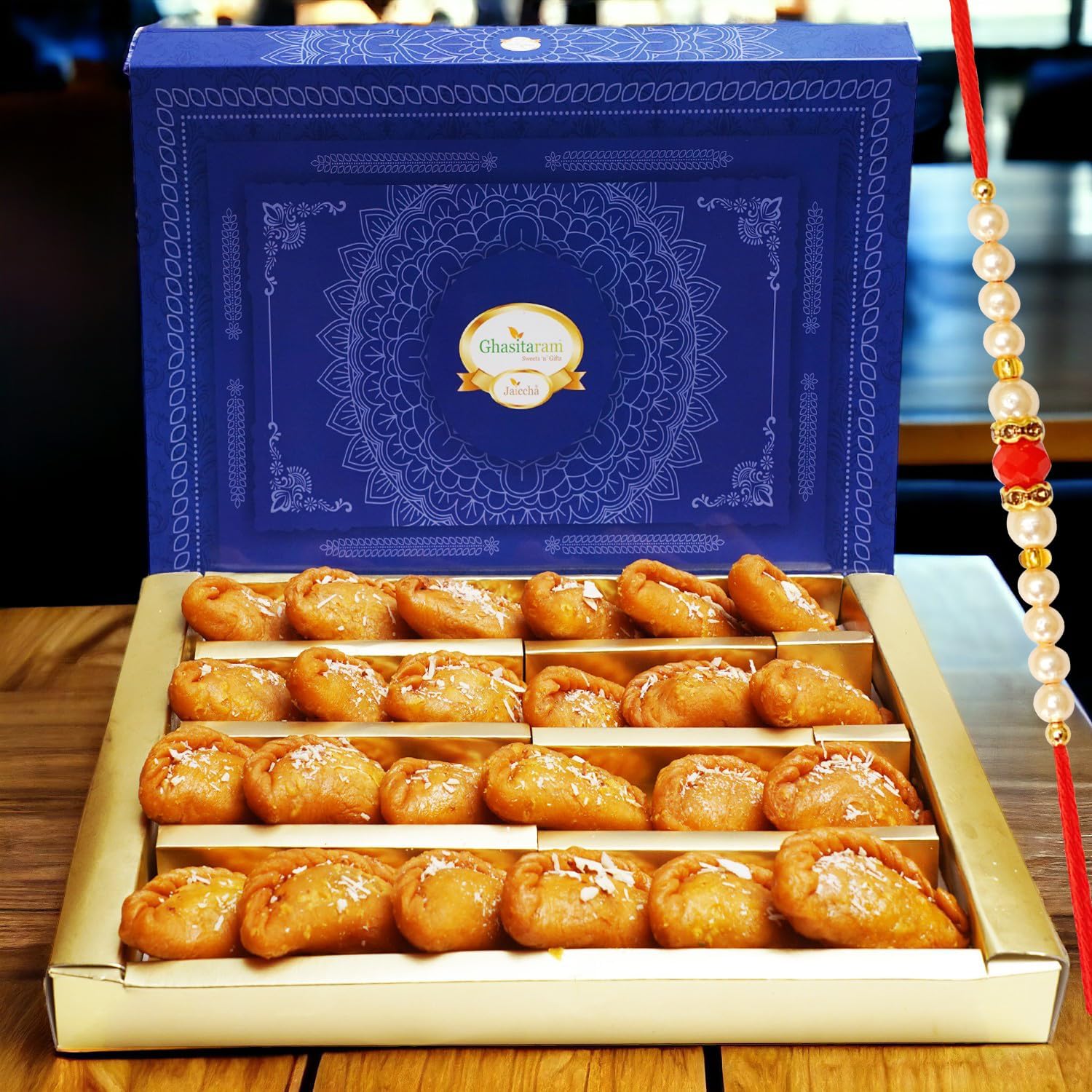 Ghasitaram Gifts Rakhi Gifts for Brothers Rakhi Sweets - Gujiya Box (800 GMS) with Beads Rakhi