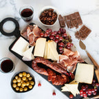 igourmet Spanish Fiesta Classic Gift Box - Includes a gourmet cheese assortment, ham, Spanish Chorizo, Spanish olives, and gourmet nuts.