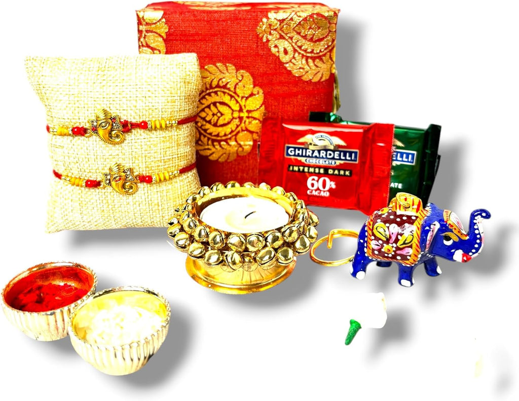 LOVENSPIRE Rakhi Gift Hamper for Brother 2PC Ganesha Rakhi with Candle Holder Ceramic Key Chain Roli Chawal Rakshabandhan Card Chocolates with Premium Brocade Gift Box - Bracelet for Bhai Bhabhi