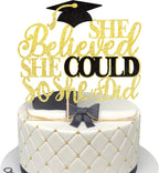 1 PCS She Believed She Could So She Did Cake Topper with Glitter Grad Cap Cake Pick Class of 2026 Senior Graduation Cake Decoration for 2026 Graduation Theme Party Decorations Supplies Black Gold