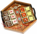 Ghasitaram Gifts Rakhi Gifts for Brothers Hexagon Tray of Assorted Bites, Roli Chawal Container and Bhaiya Bhabhi Rakhis