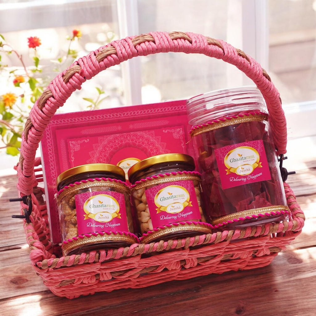 Ghasitaram Gifts JaicchaLohri sweets Gachak hampers Lohri Hamper Pink Jute Rectangle Basket with Mawa Til Laddoo