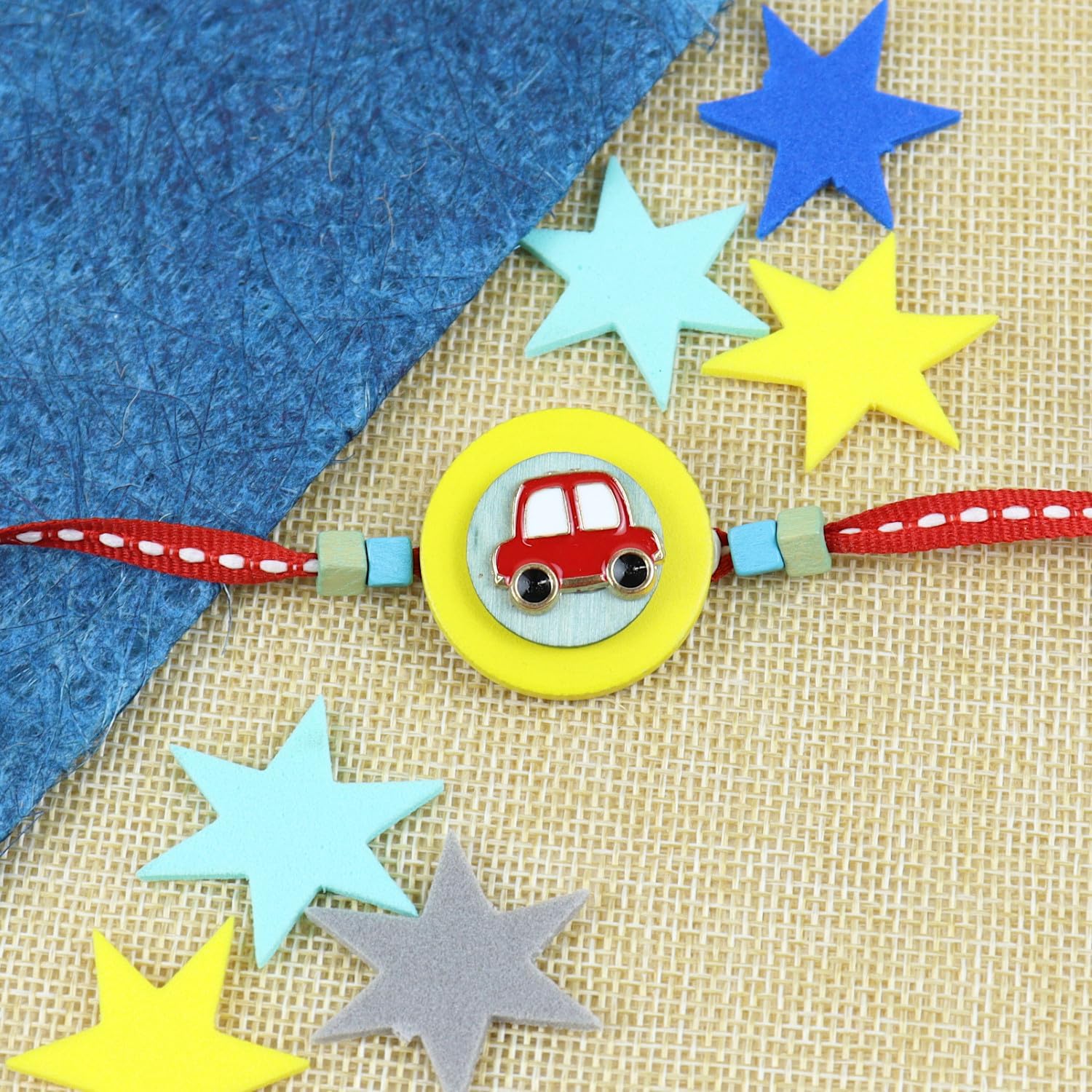 Ghasitaram Gifts Jaiccha Rakhi for Brother Rakhis Online KR24-056- Metal car Kids Rakhi