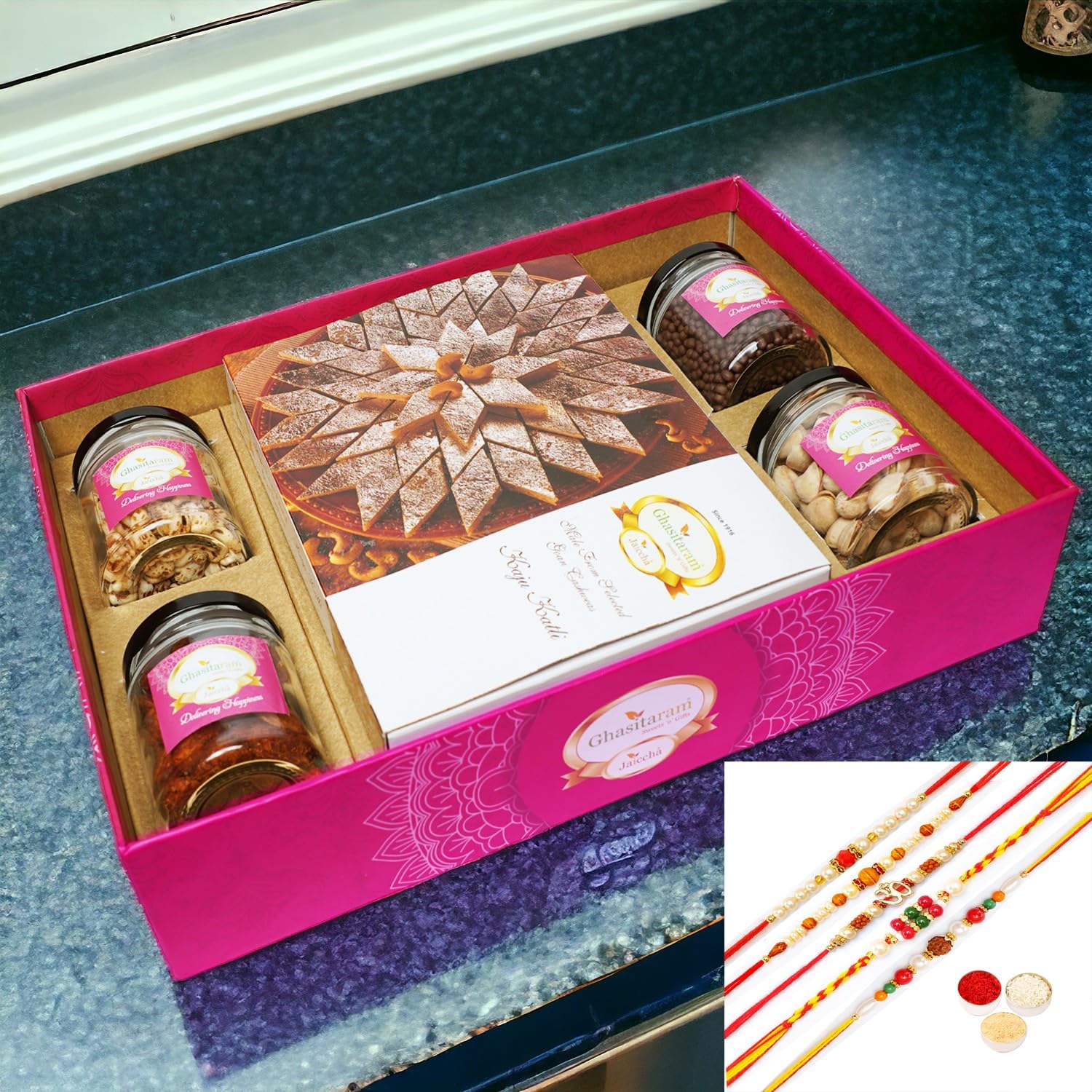 Ghasitaram Gifts Jaiccha Rakhi Gifts for Brothers-Big Hamper Tray of Kaju Katlis, Peri Almonds, Pistachios, Wheat Puffs and Choco Rice Crispies with 5 rakhis